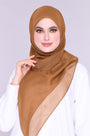 A woman wearing bawal qaseh 20 with crystal embellishments.